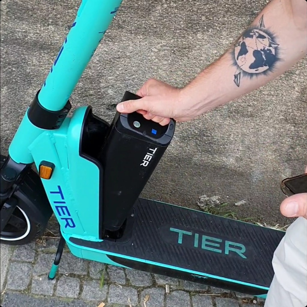 Removing battery from TIER scooter